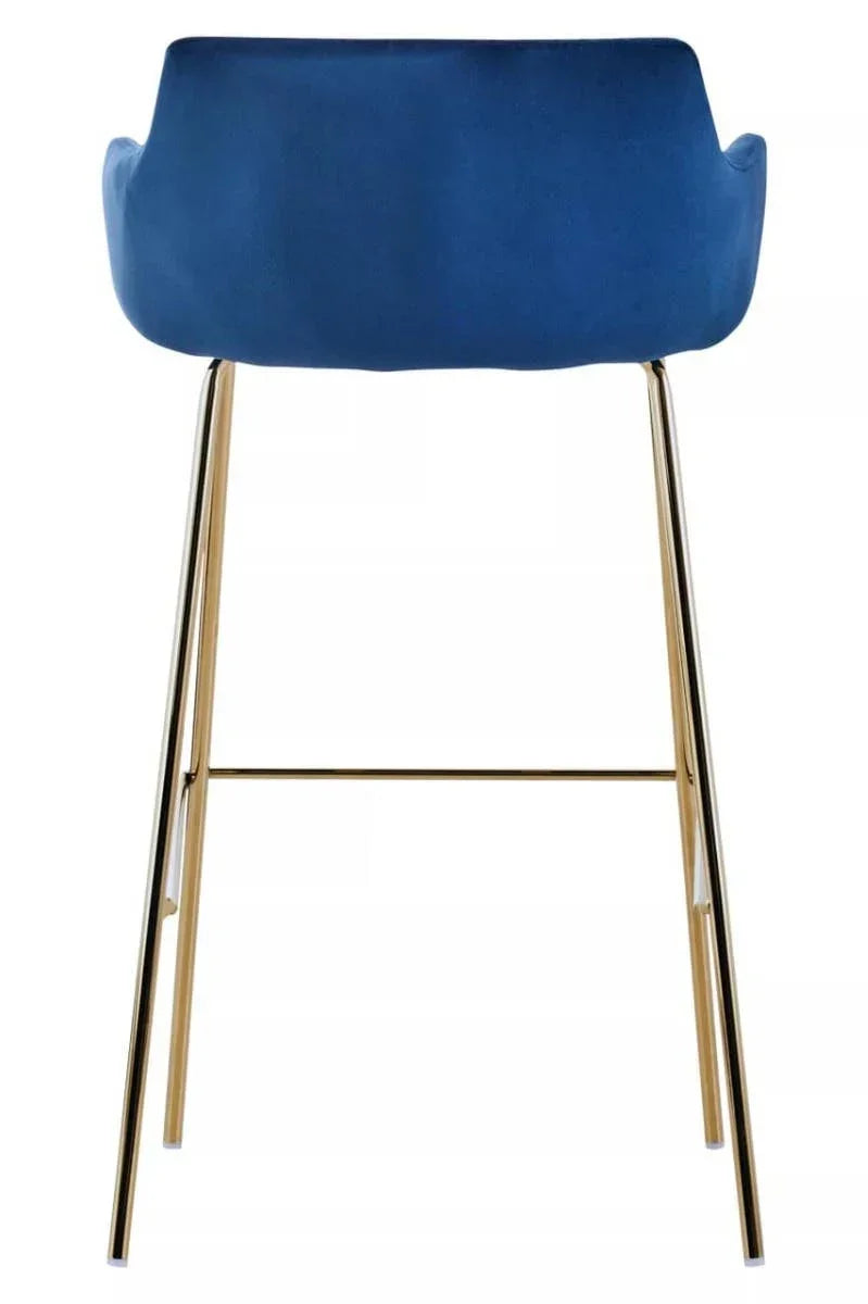Blue velvet bar stool with gold metal legs shown from rear angle
