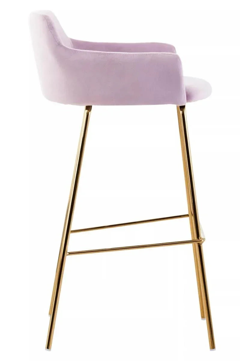 Velvet bar stool with gold metal legs and pale pink upholstered seat, side profile view