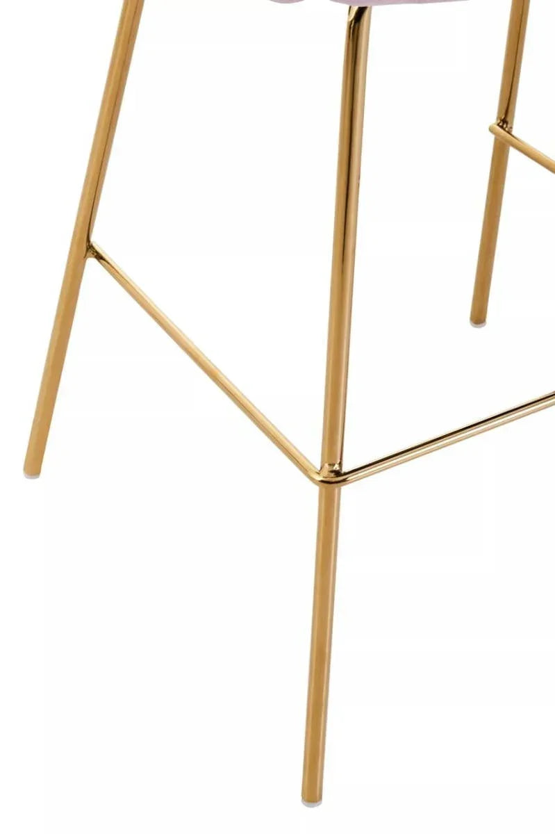 Gold metal bar stool legs with a footrest detail, partial side angle view