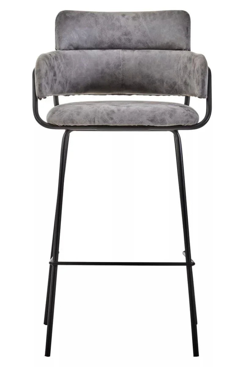 Grey bar stool with padded seat, tubular metal legs, and curved backrest