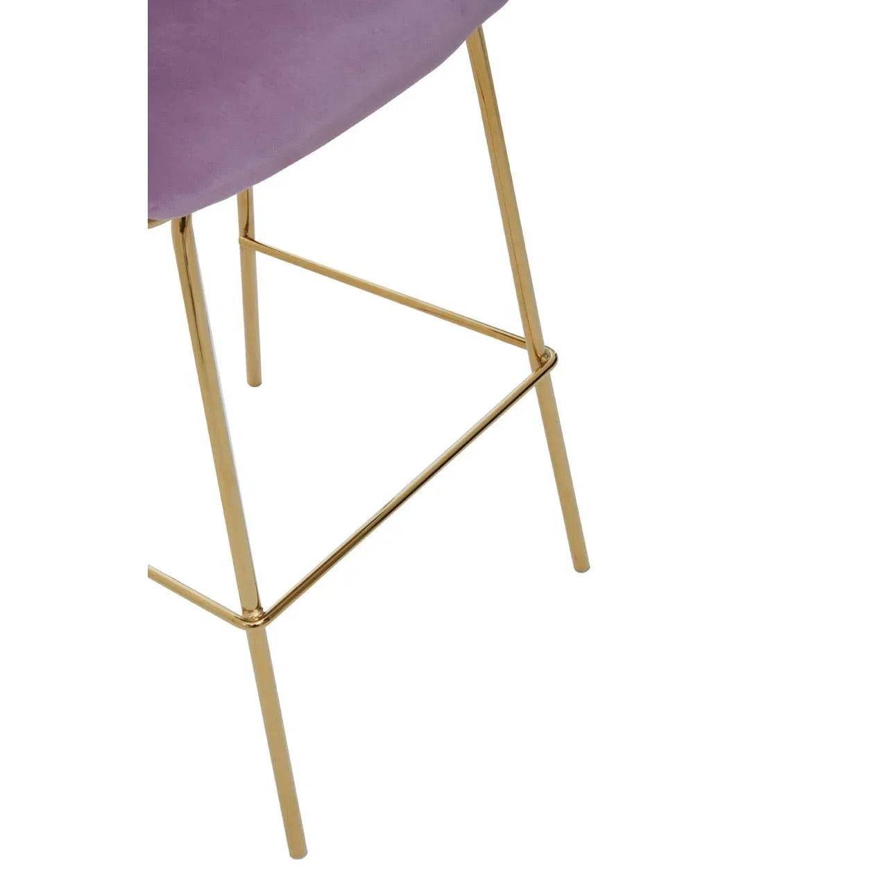 Close view of gold metal bar stool legs with purple upholstered seat
