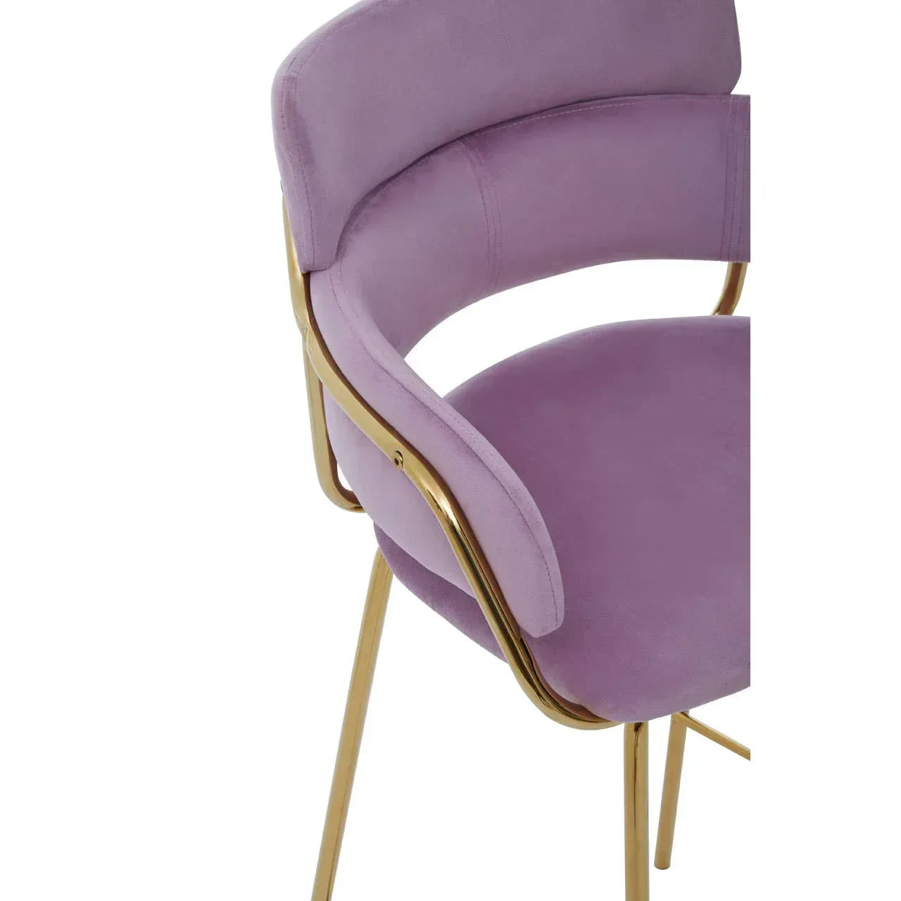 Purple velvet accent chair with gold metal legs and curved backrest, close side angle