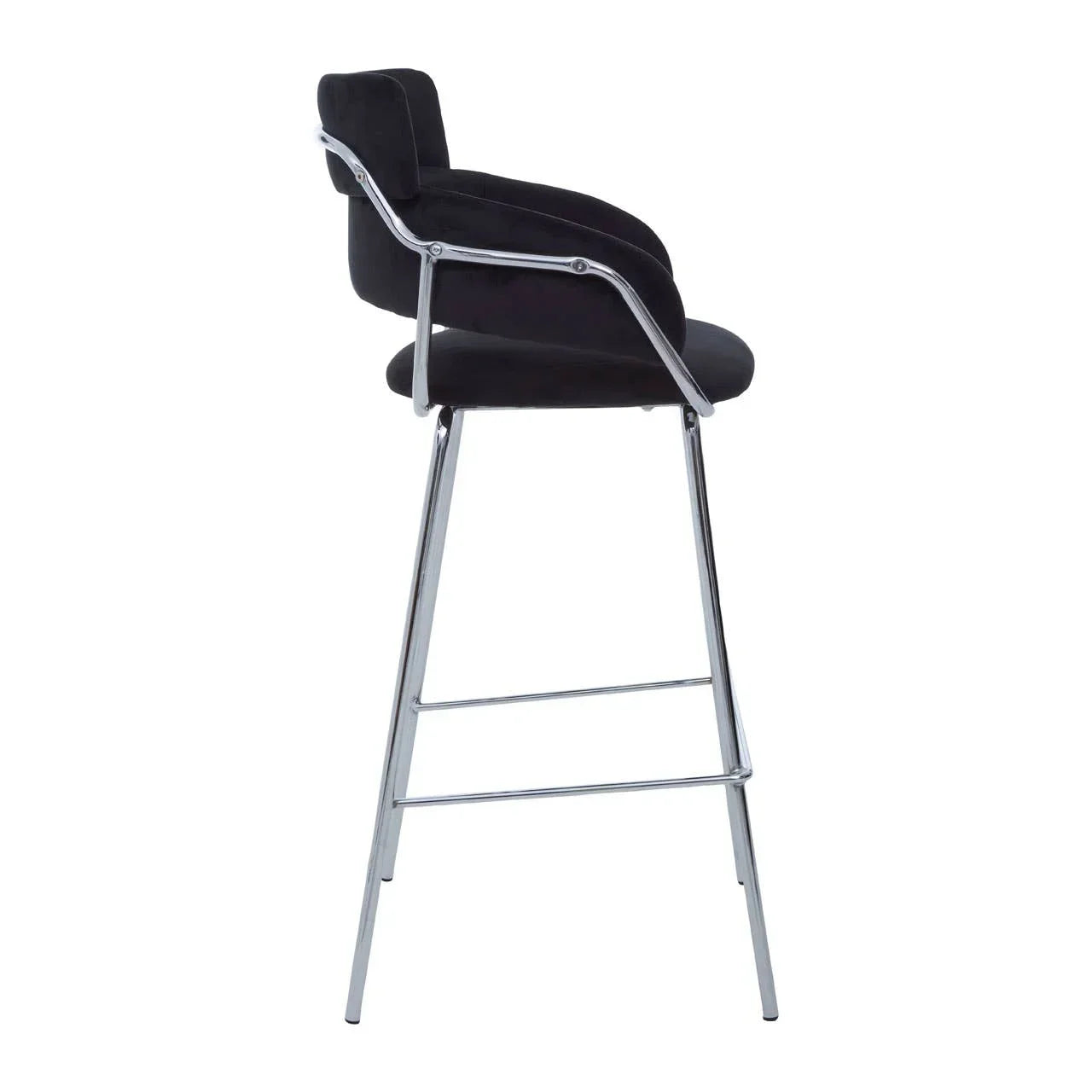 Black velvet bar stool with chrome legs and curved armrests, side profile view