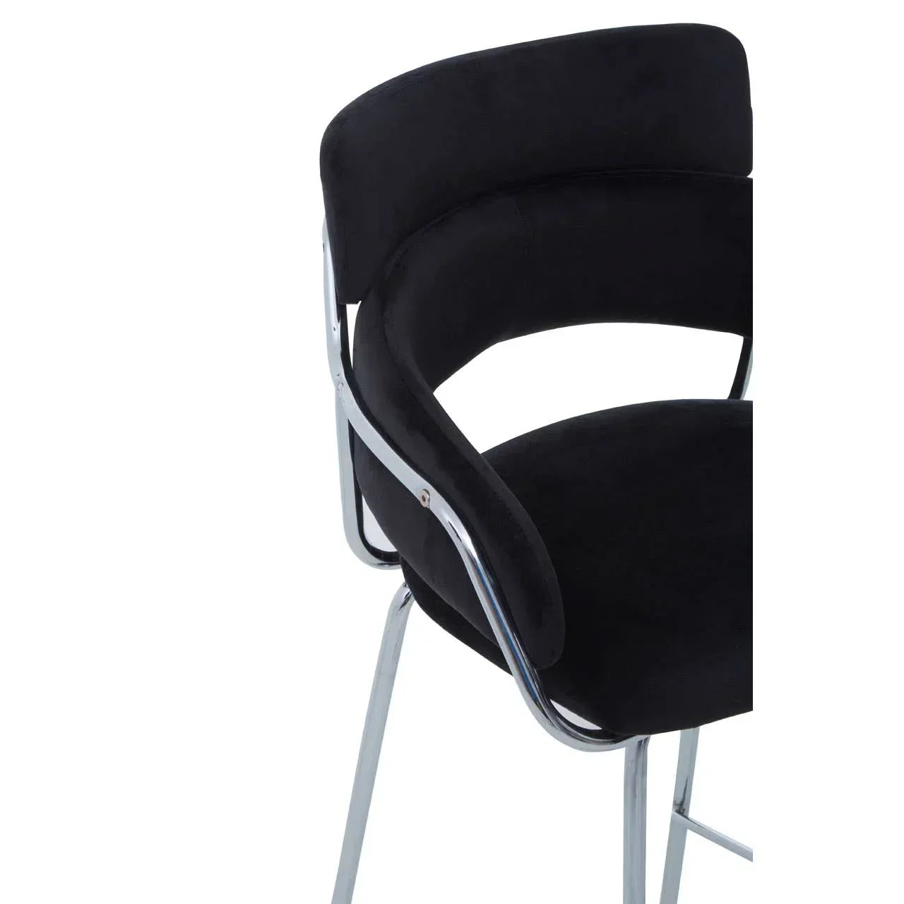 Black velvet bar stool with curved backrest and chrome legs, side view