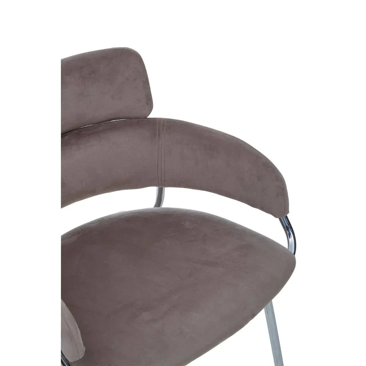 Close-up of grey fabric dining chair with chrome metal frame and padded armrest