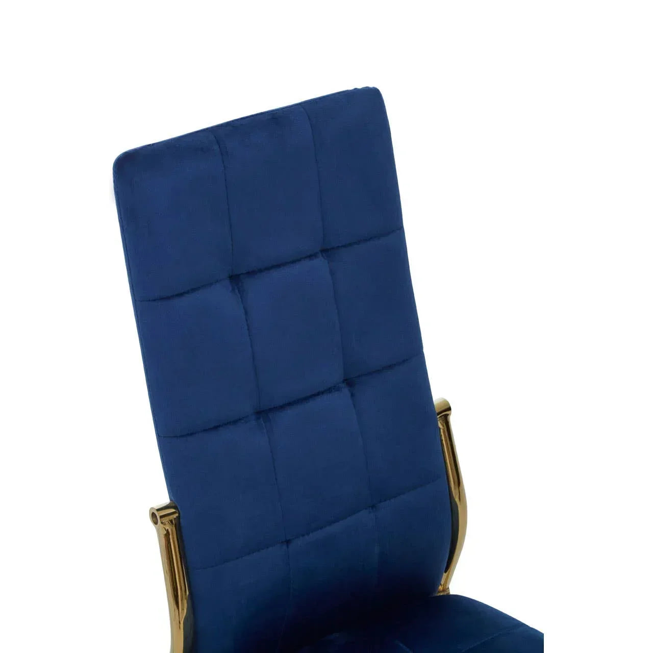 Blue velvet dining chair with gold metal arm detail and high quilted backrest