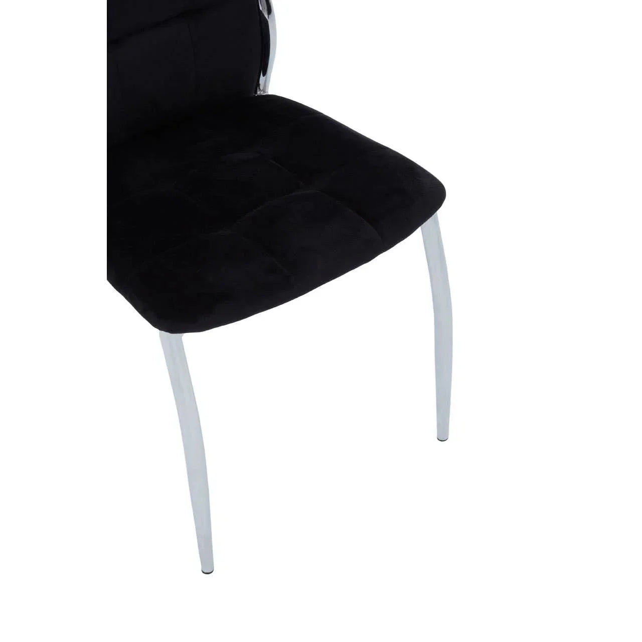 Black velvet dining chair with chrome legs, close view of seat and front design