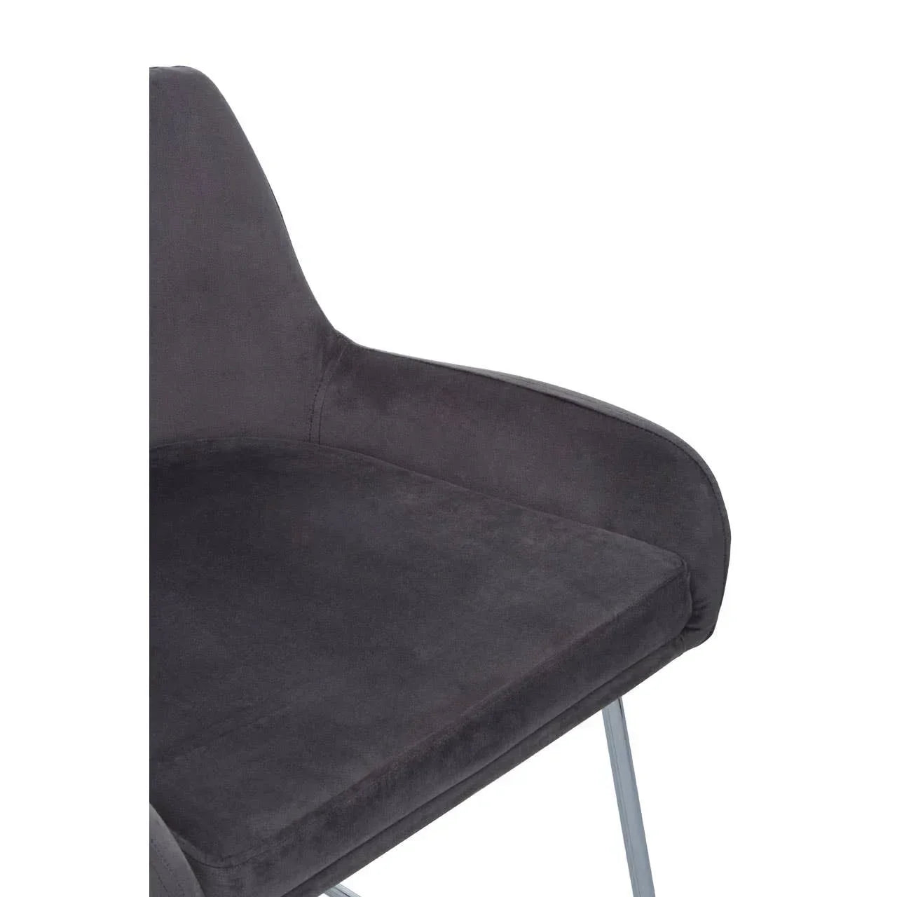 dark grey fabric dining chair with armrest and metal legs, close-up view