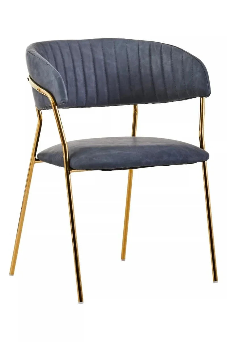 Grey velvet dining chair with gold metal legs and curved backrest