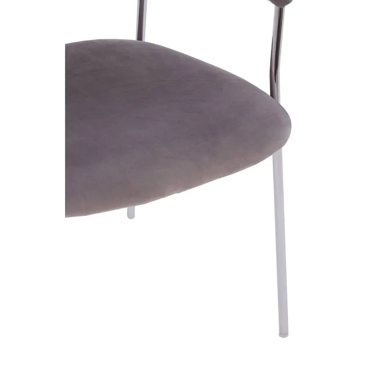 Closeup of grey fabric dining chair seat with chrome metal legs