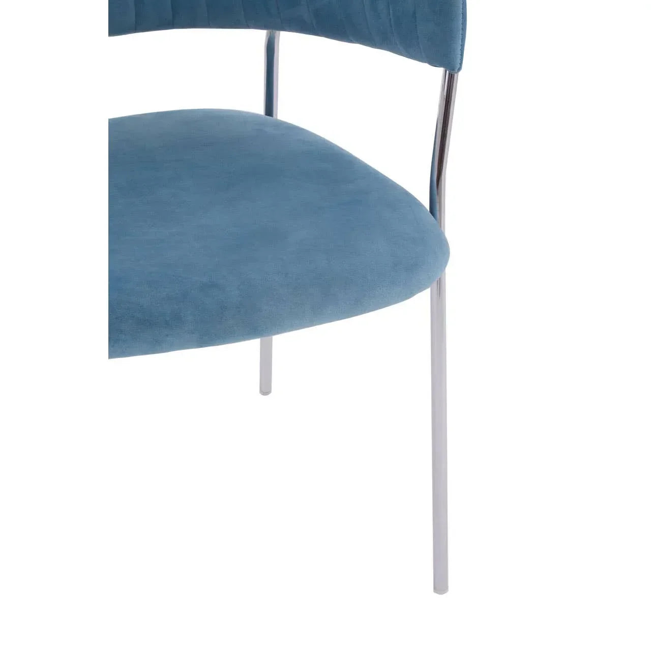 Blue velvet dining chair with chrome legs, close-up of seat and backrest