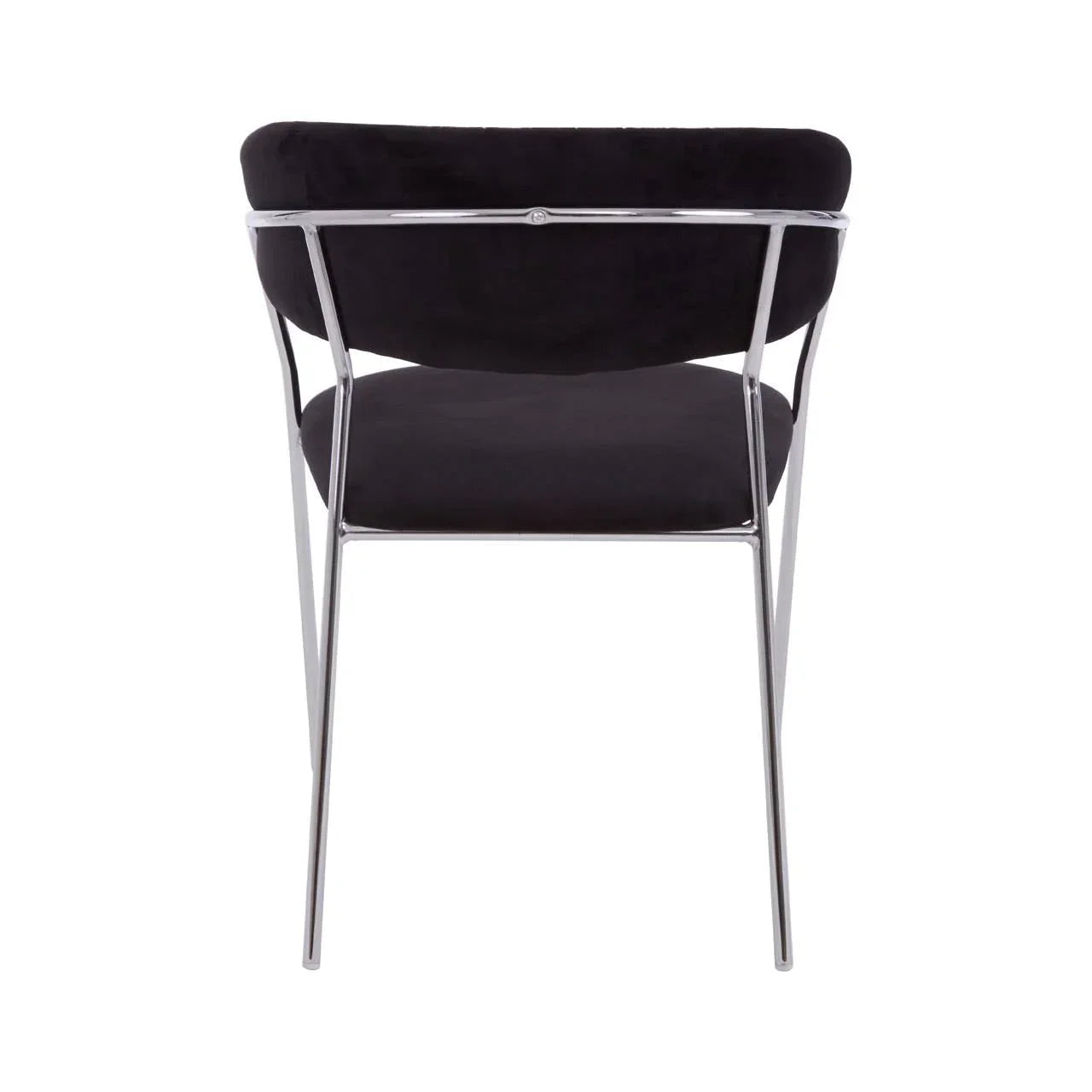 Black velvet dining chair with chrome legs, rear view highlighting metal frame