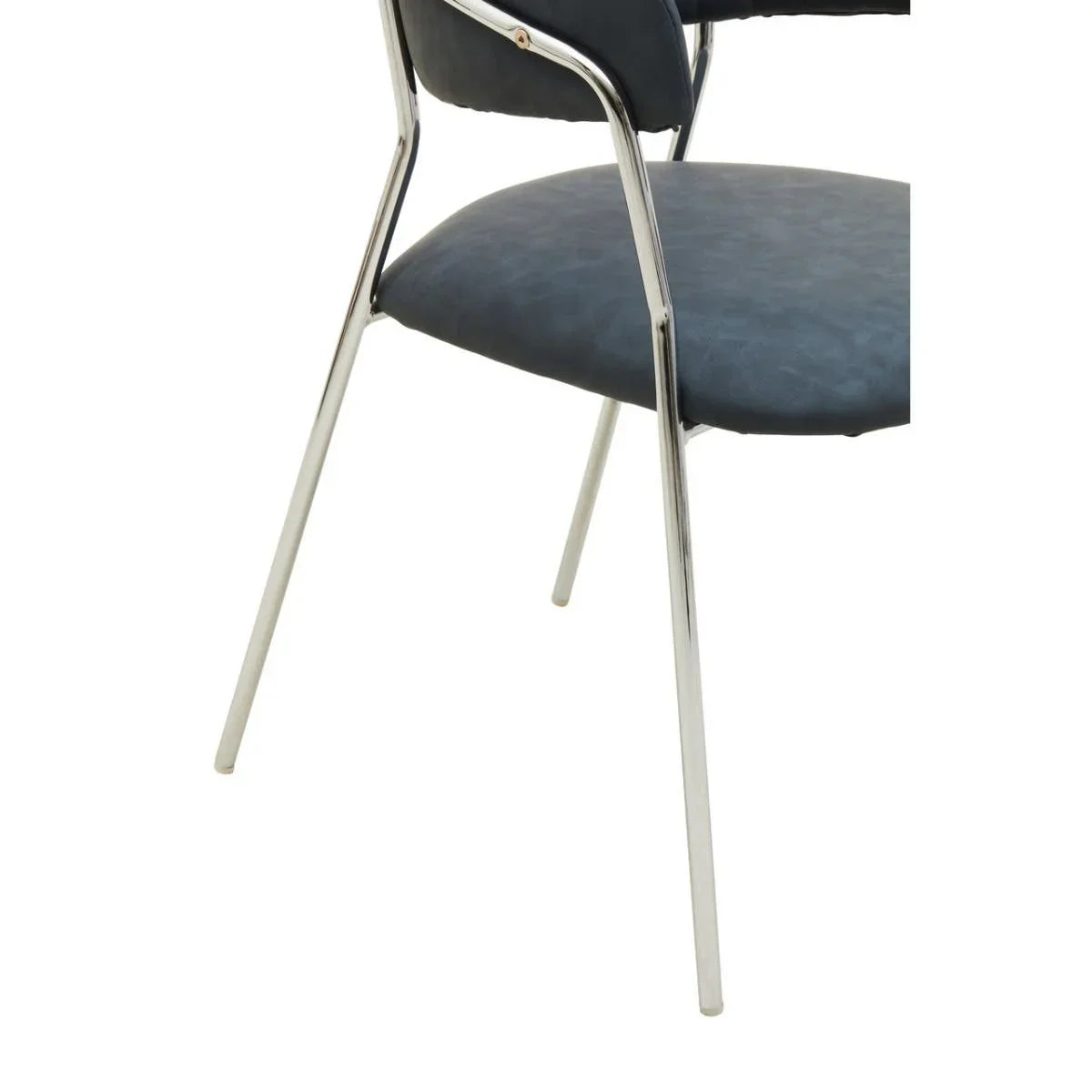 Closeup of modern dining chair with chrome legs and dark upholstered seat