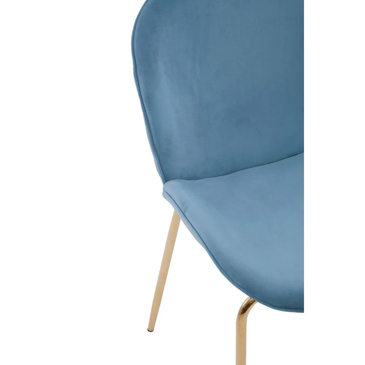 Blue velvet dining chair with gold metal legs, partial side view