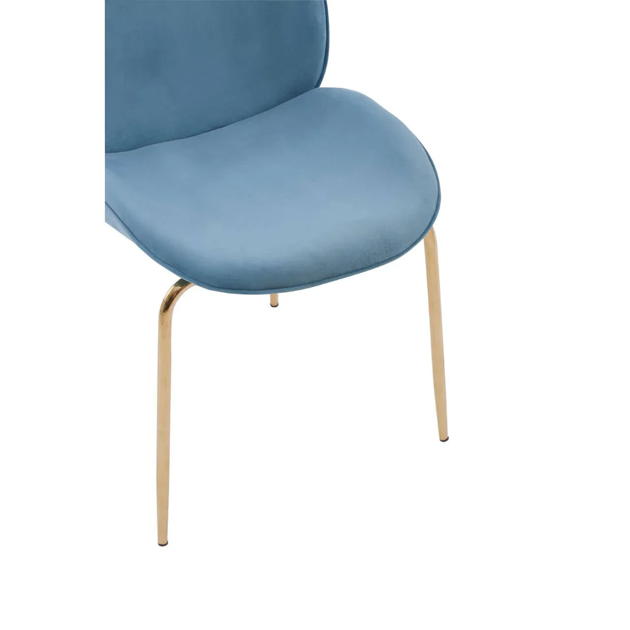 Blue velvet dining chair with gold metal legs, partial side view
