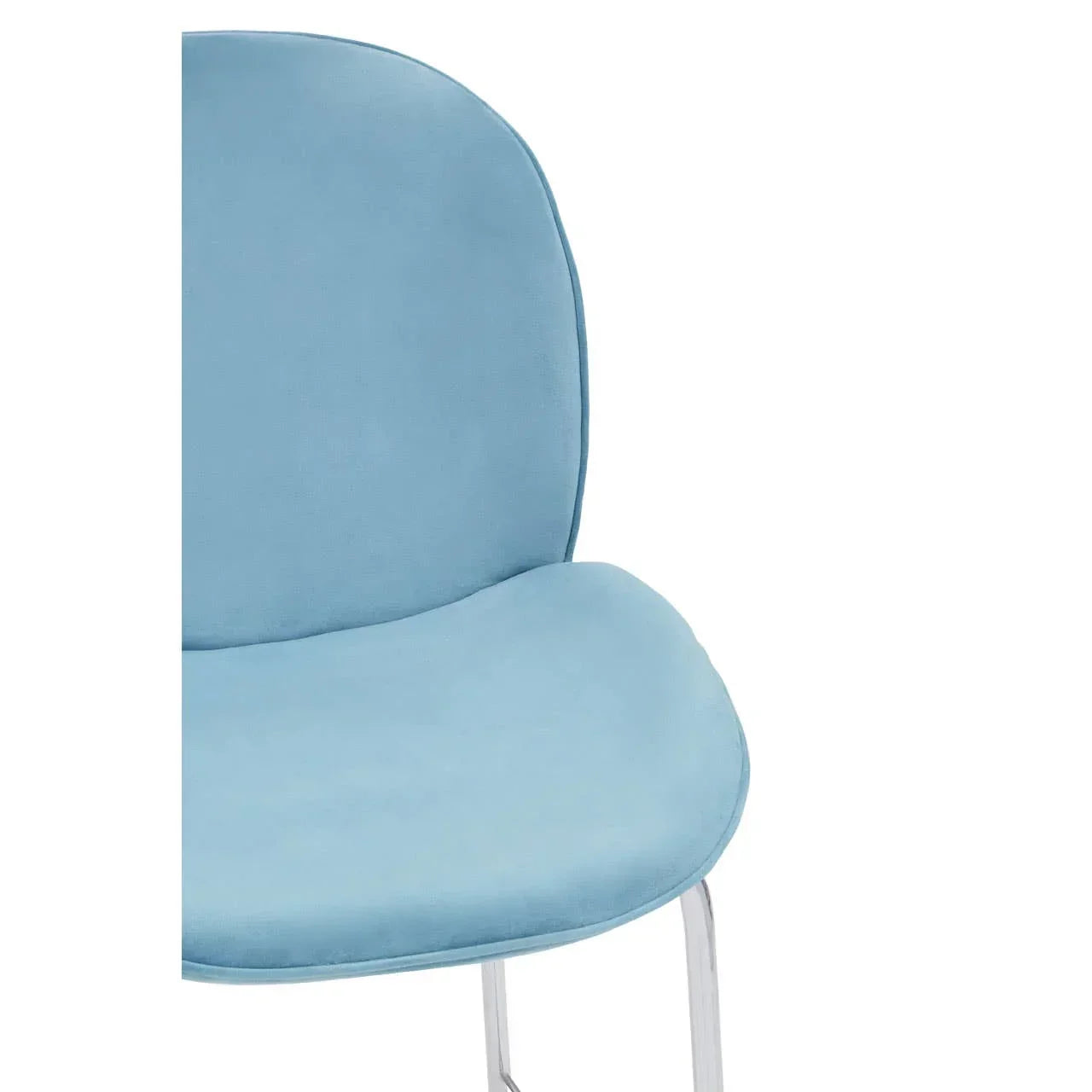 Close-up of blue fabric dining chair seat and backrest with metal legs