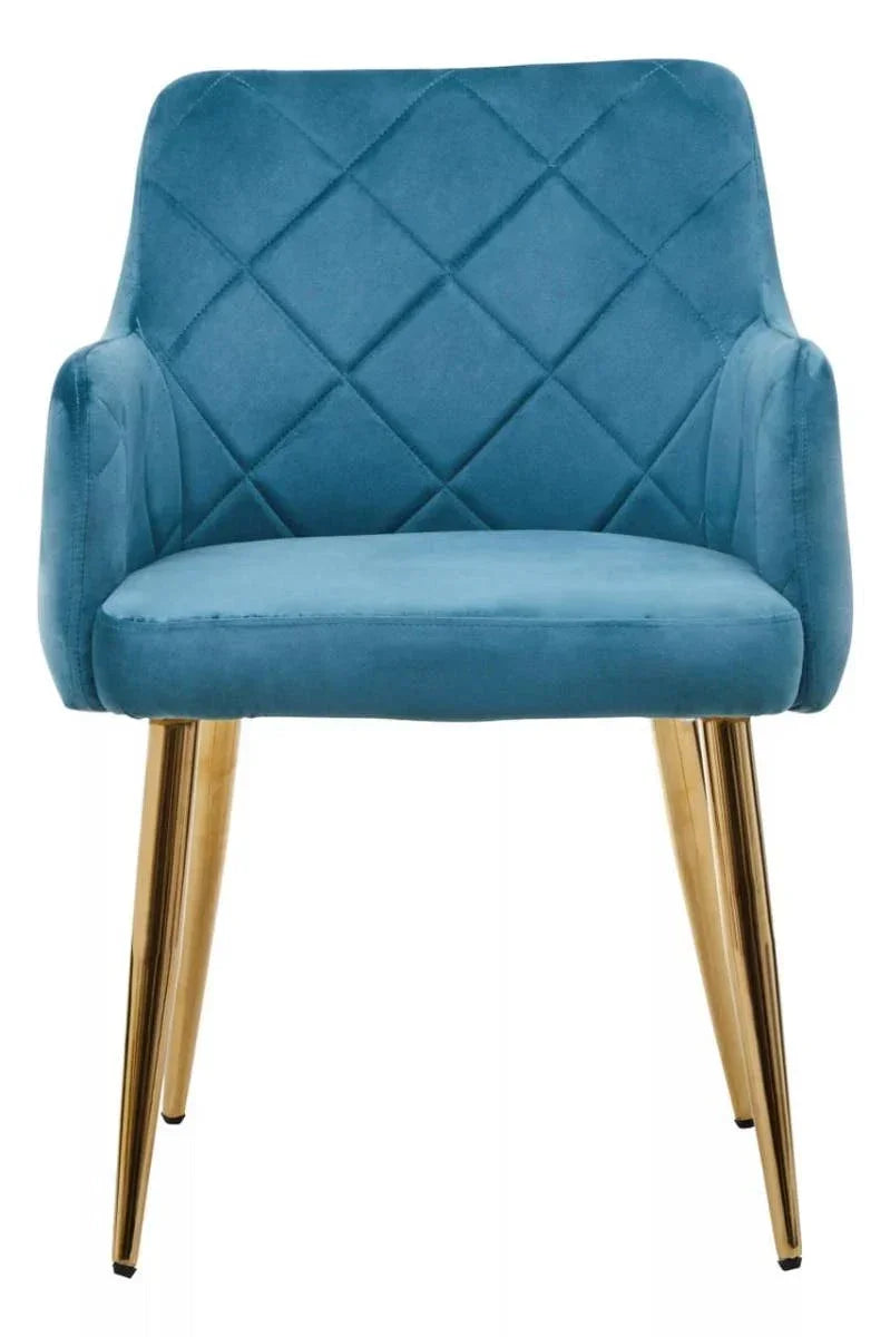 Blue velvet accent chair with diamond stitching and gold metal legs, front view