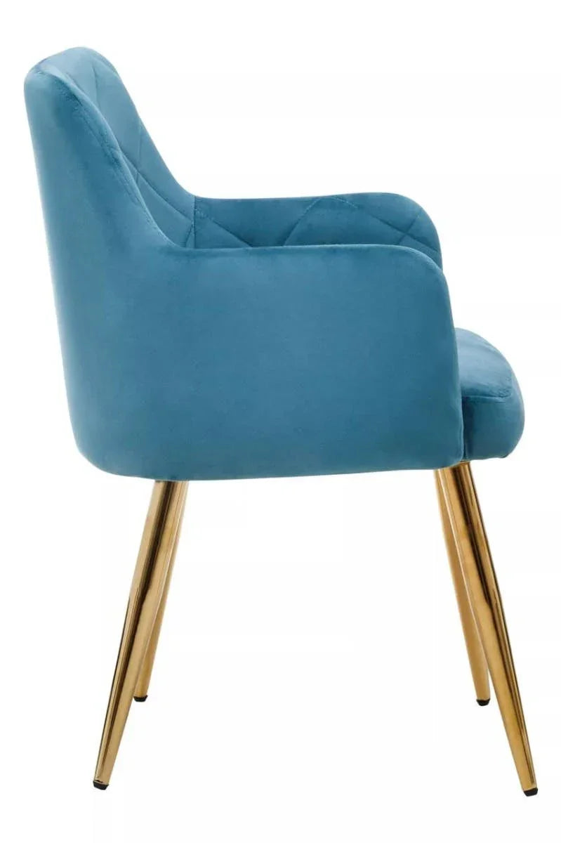 Blue velvet accent chair with gold metal legs, side view