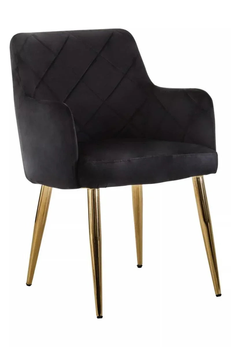 Black velvet dining chair with quilted backrest and gold metal legs