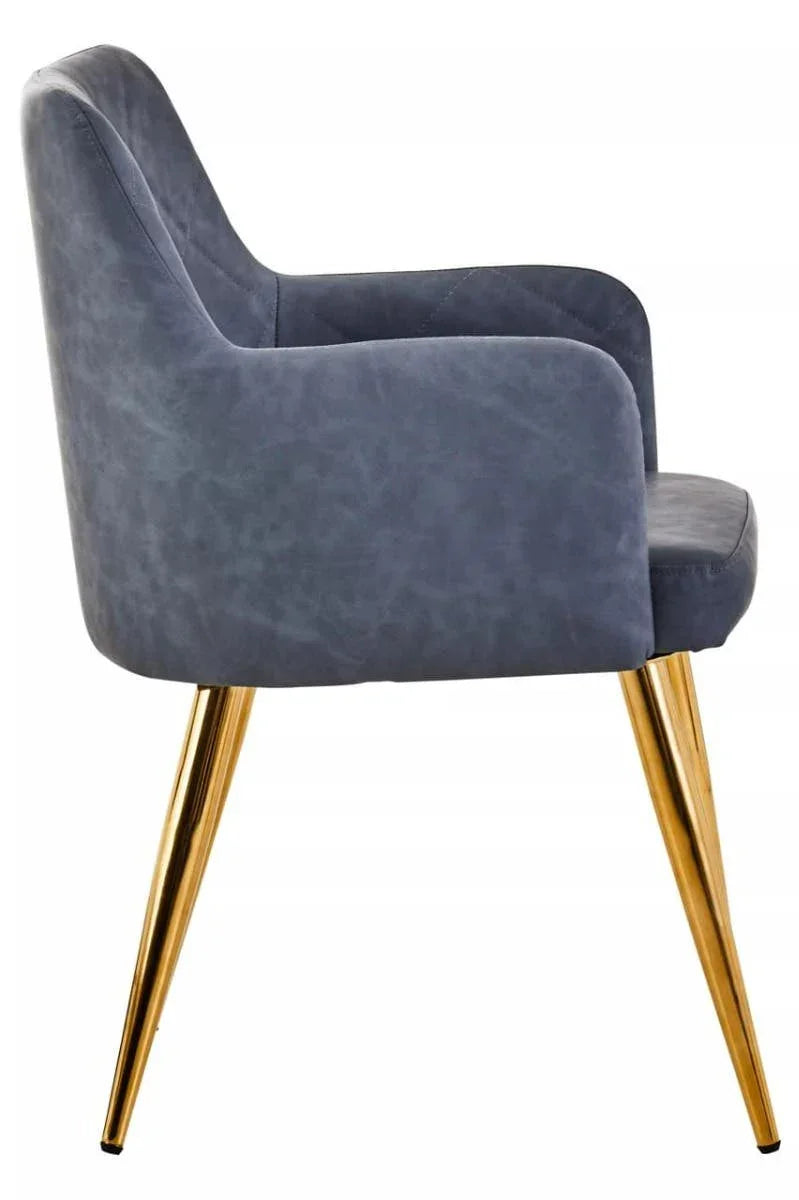 Modern blue upholstered dining chair with gold metal legs, side view
