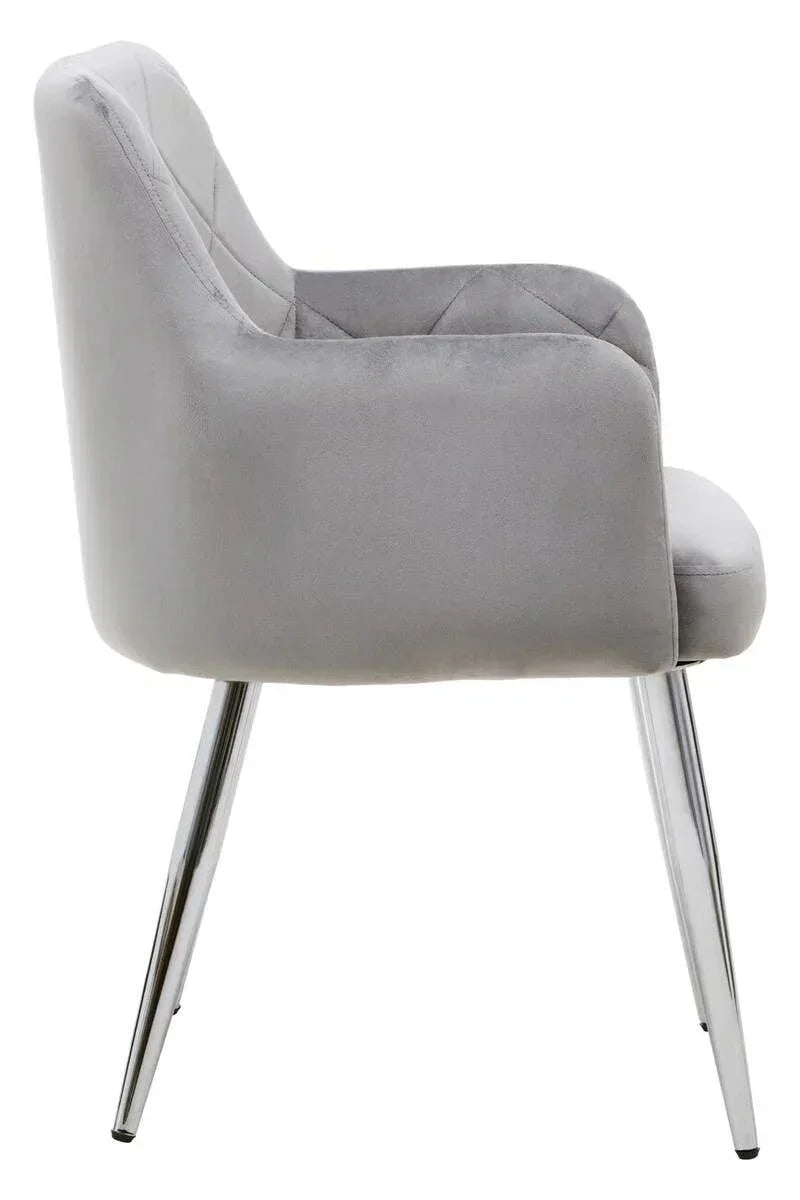 Grey velvet dining chair with chrome legs, side profile view