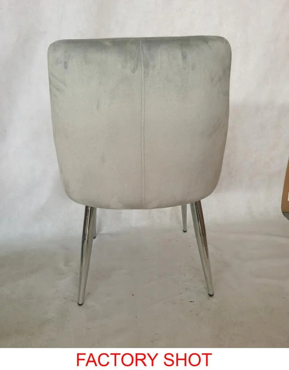 Grey velvet dining chair with chrome legs rear view