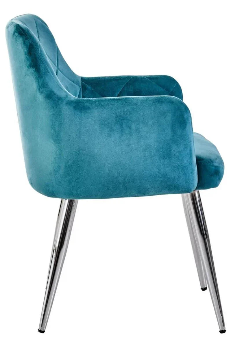 Blue velvet dining chair with chrome legs side view