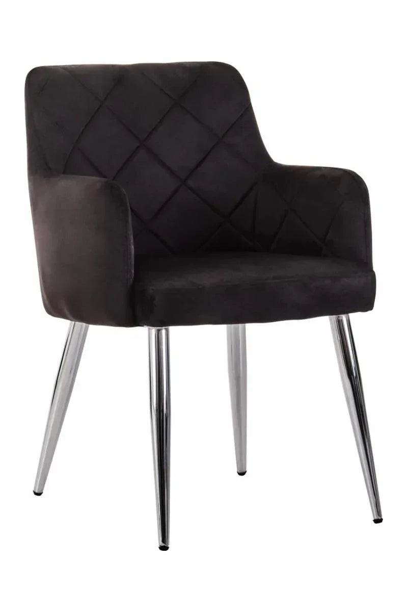 Black velvet dining chair with diamond-stitched backrest and chrome metal legs
