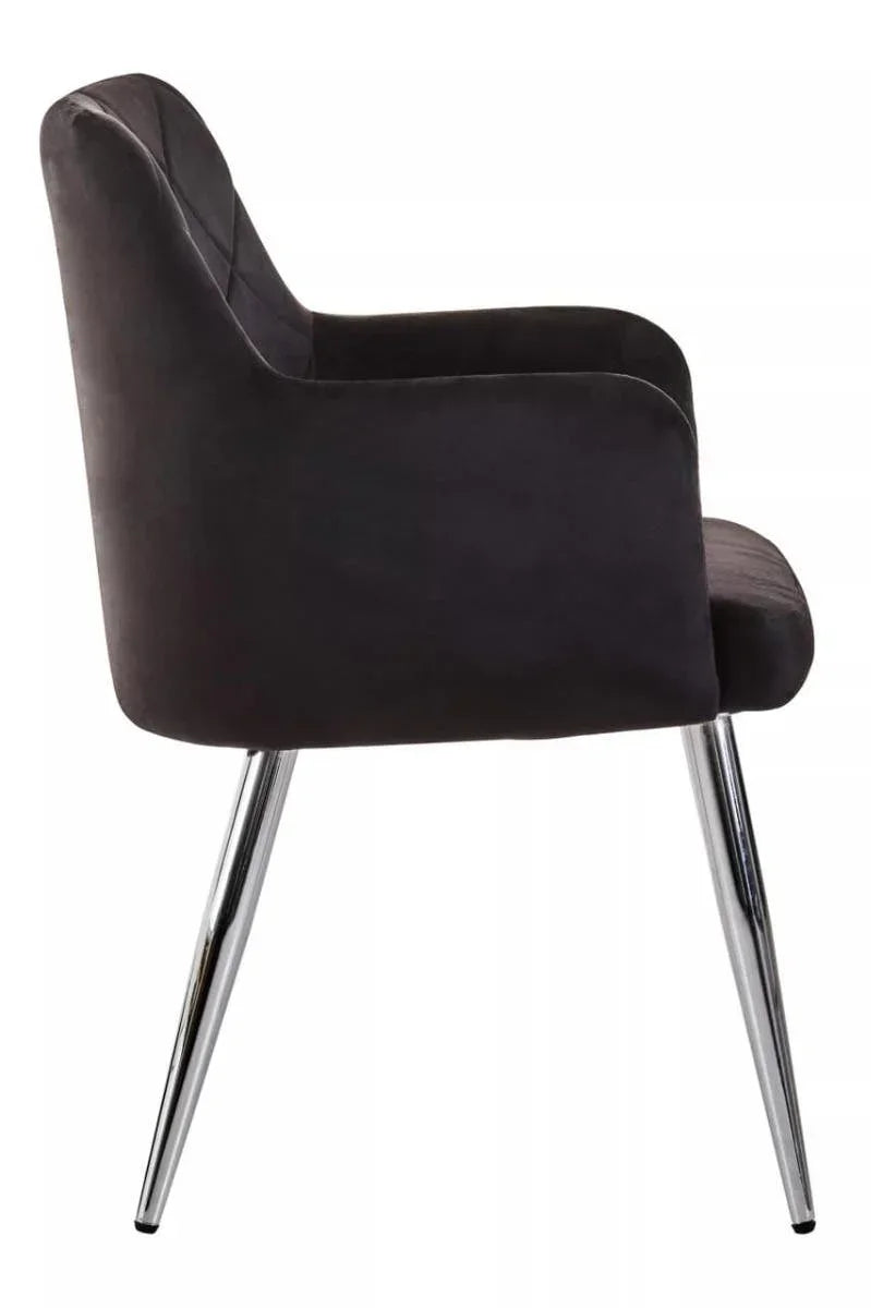 Side view of black velvet dining chair with chrome legs