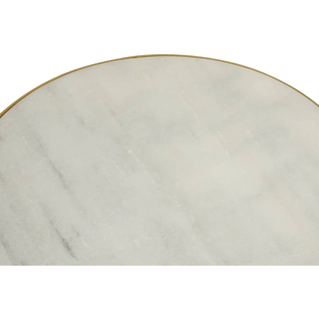 Close view of round white marble table top with gold metal edge