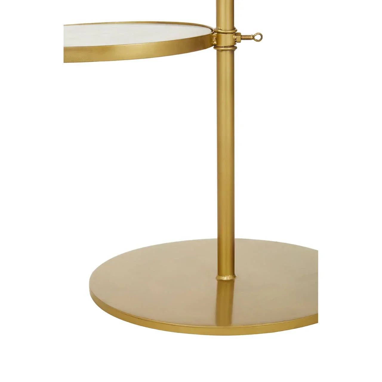 Gold metal side table with round base and white marble top, close up of frame detail