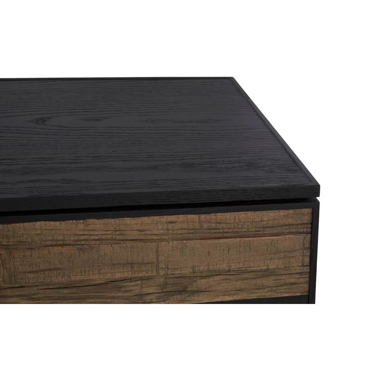 Close-up of black wood furniture top with textured brown drawer front