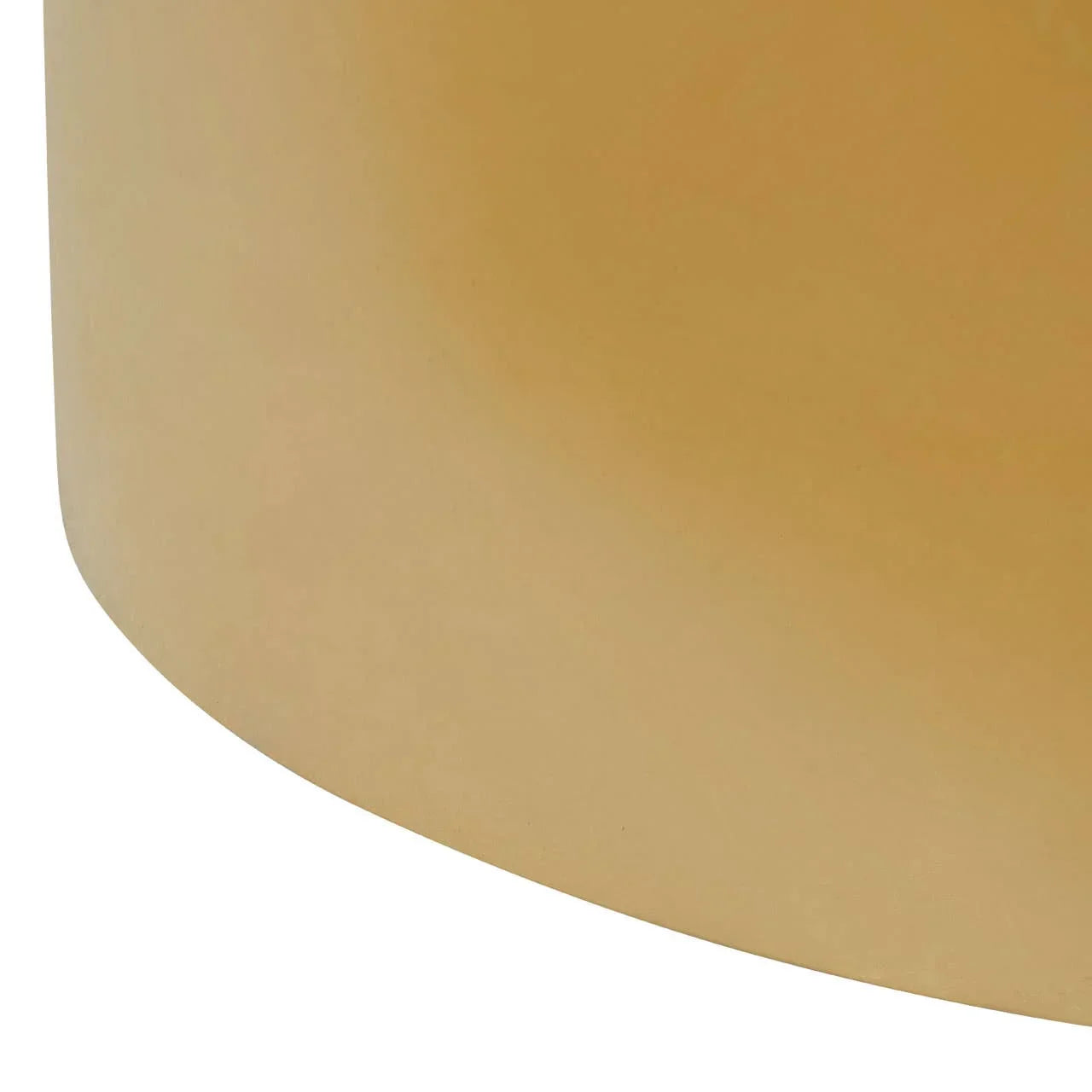 Close up of gold metal coffee table base with smooth matte finish