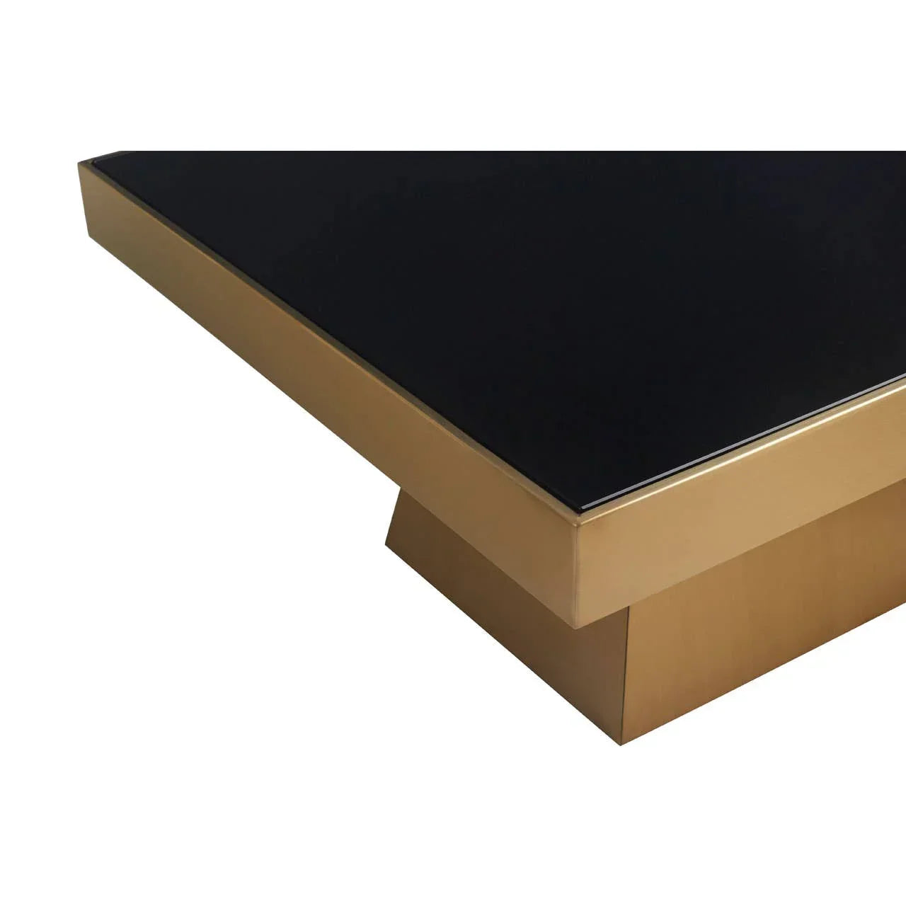 Gold and black coffee table with rectangular base and glossy finish, close-up corner view