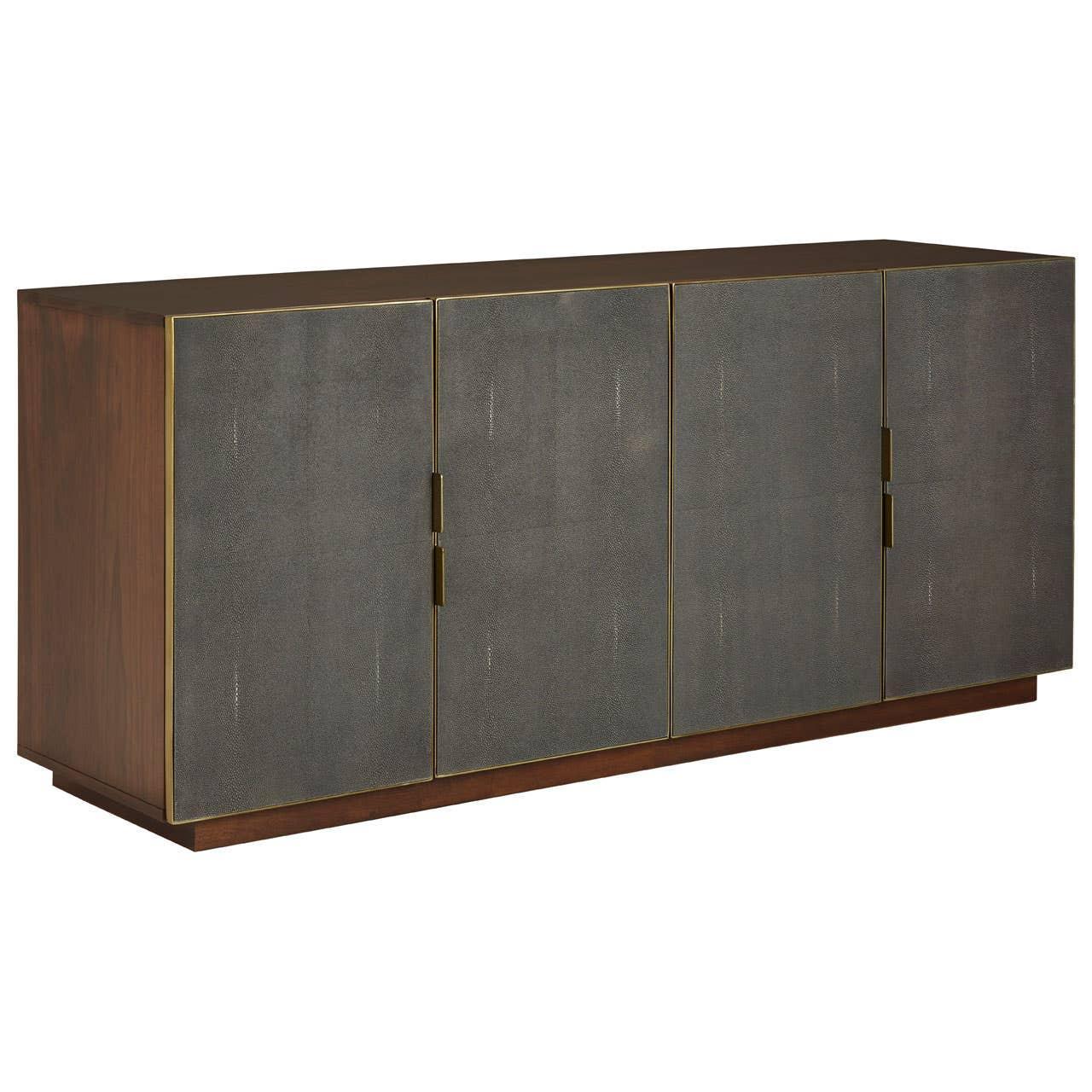 Modern sideboard cabinet with four textured grey doors and brass handles, walnut finish
