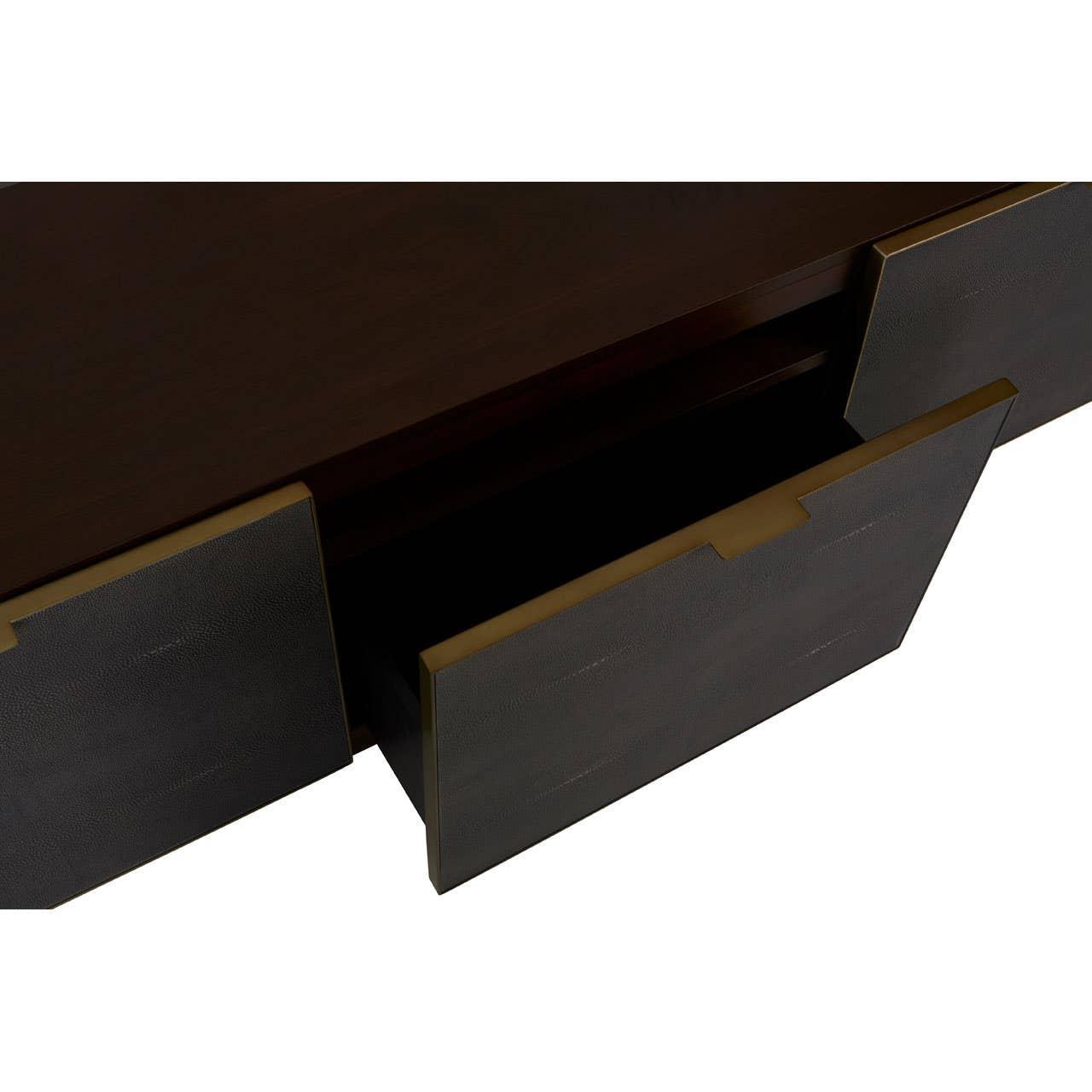 Dark wood chest of drawers with black textured front and brass handle detail