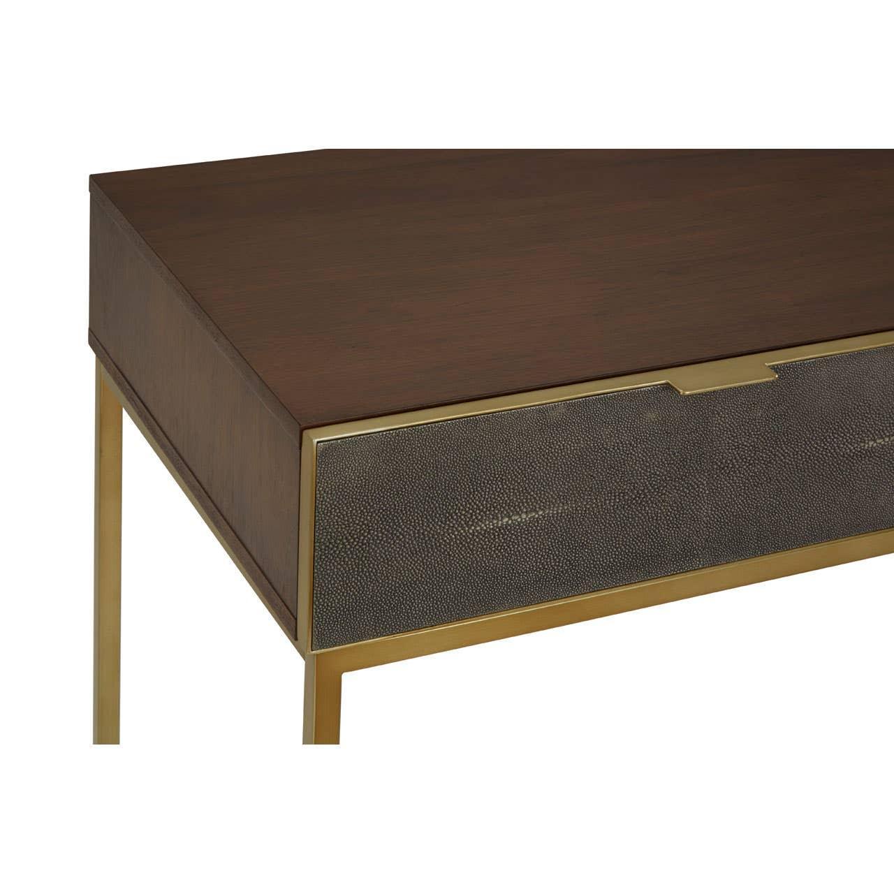Walnut wood desk with brass legs and textured drawer front detail