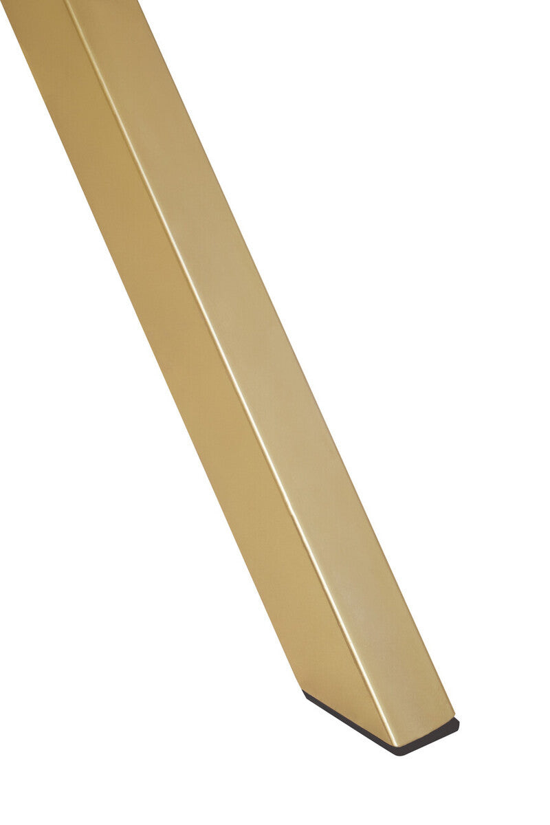 Close-up view of a tapered leg of a dining table made from white wash mango wood, showcasing a smooth finish and natural wood grain texture
