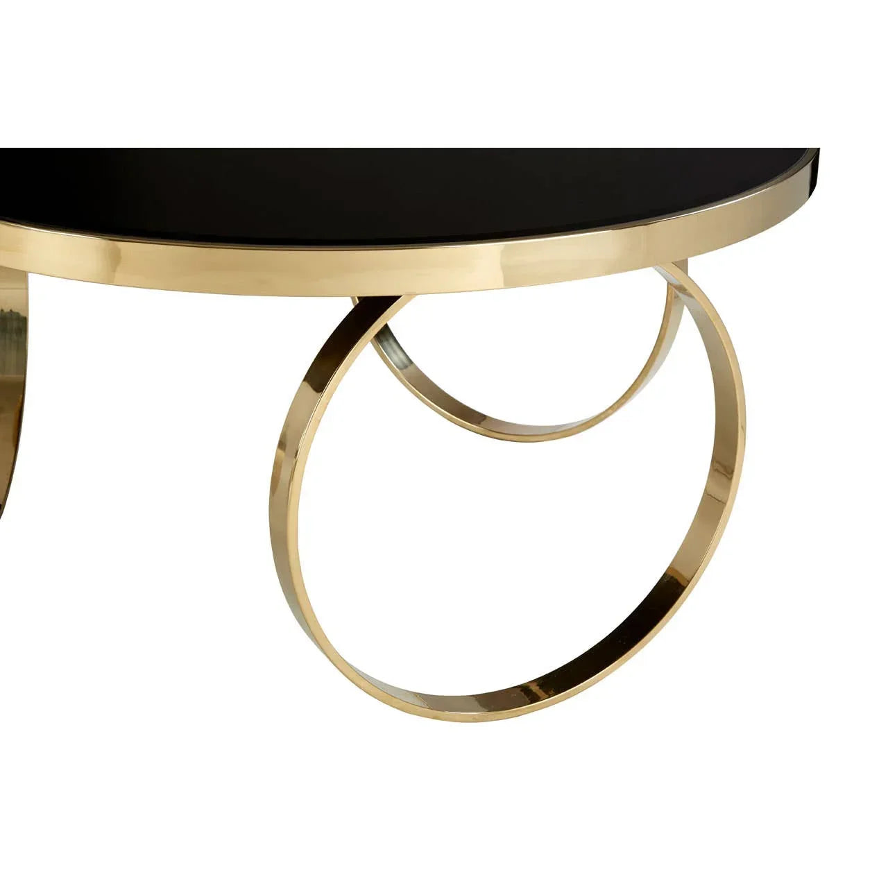 Round black glass coffee table with gold metal circular base, close-up of leg design