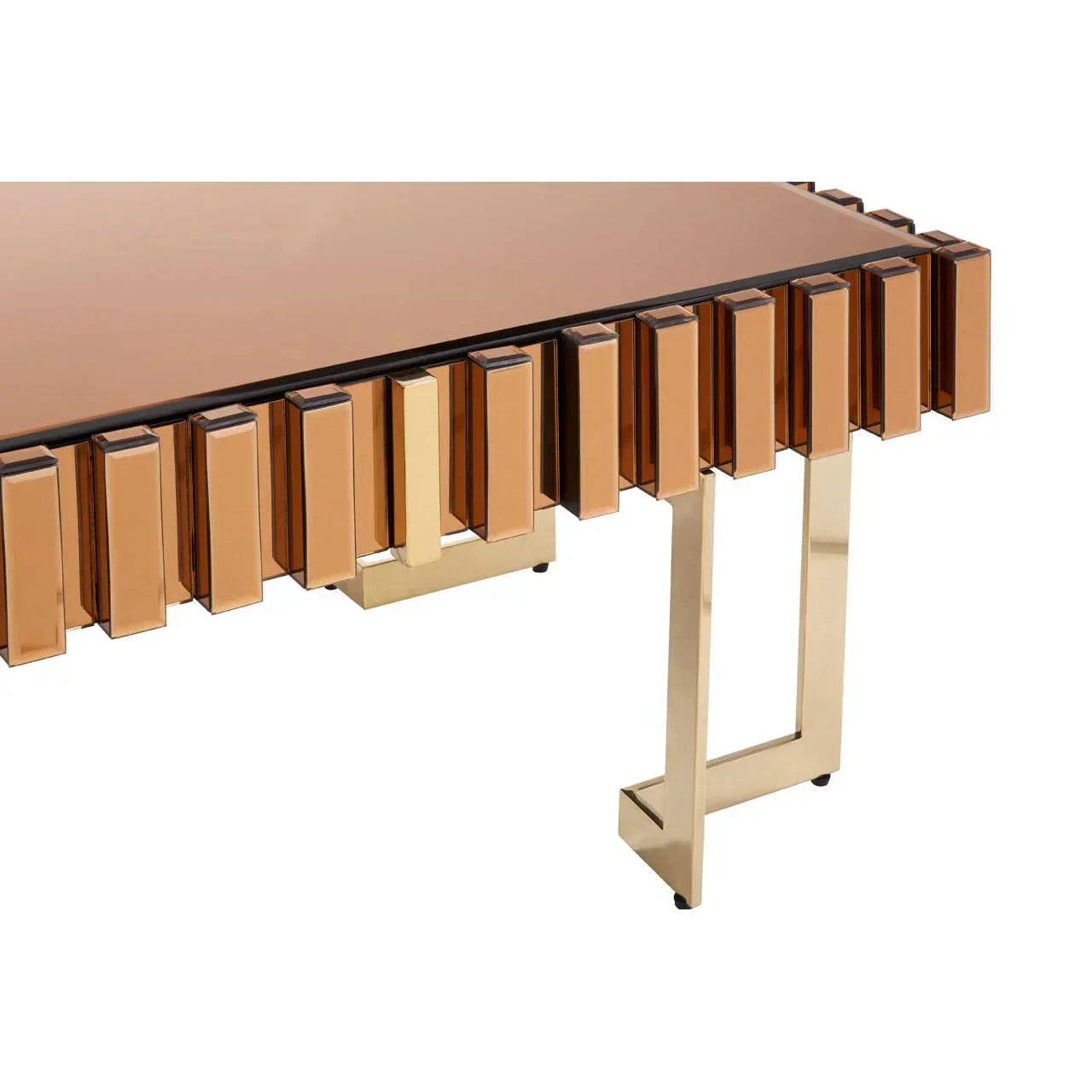 Modern gold console table with geometric mirrored panels and metallic legs, side angle view