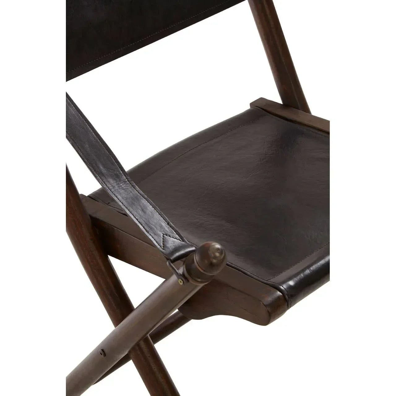 Closeup of folding chair with dark leather seat and wooden frame