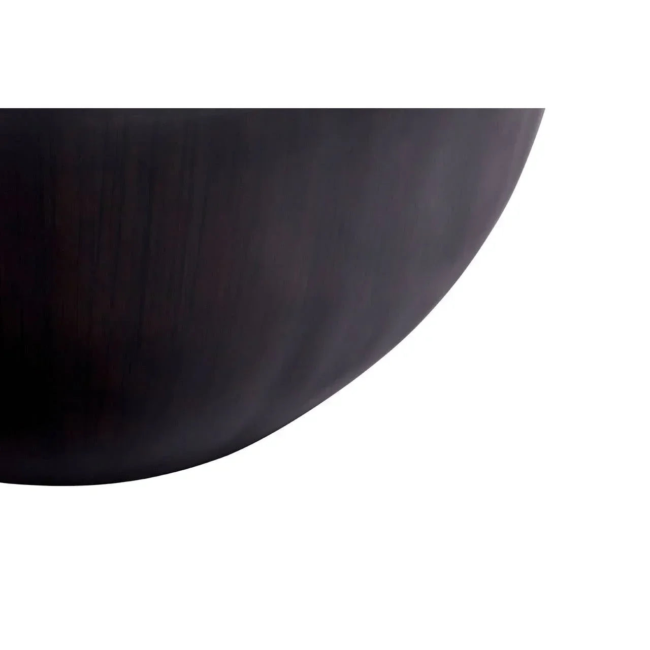 Close-up of dark wood furniture leg with smooth curved finish