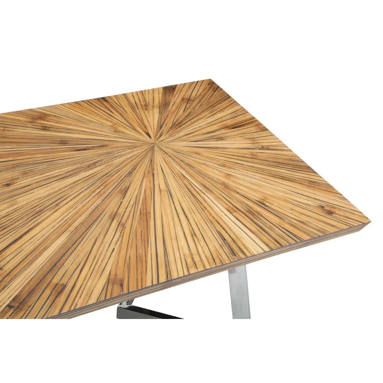 Rectangular dining table with geometric wood veneer top and metal legs, corner angle view
