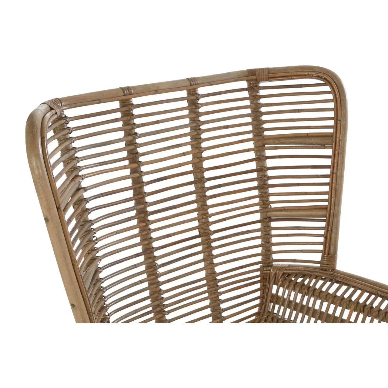 Close view of natural rattan dining chair backrest with curved woven pattern