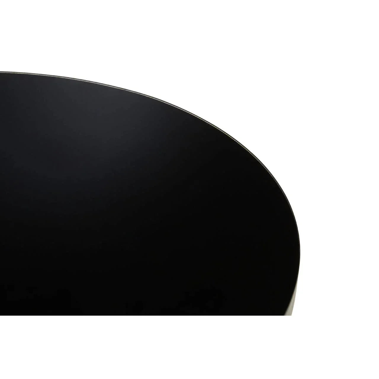 Close-up of black round table top with smooth finish