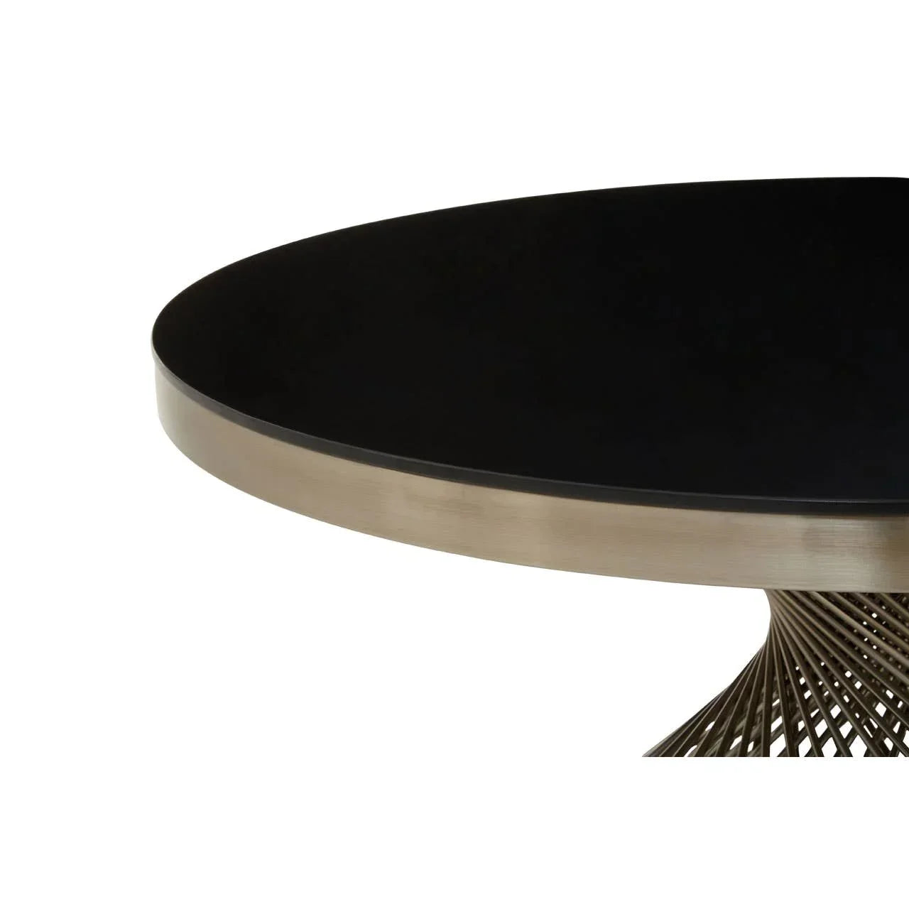 Round dining table with black top and brushed metal edge, close view of wire base