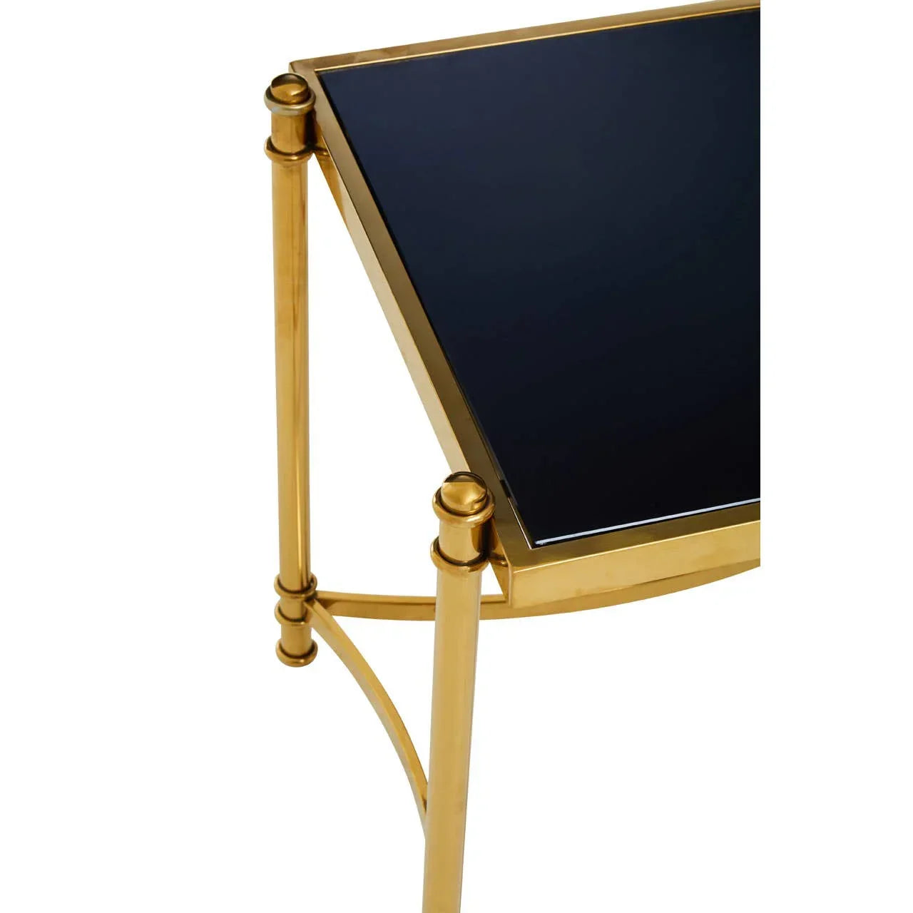 Gold metal side table with black glass top, close corner view showing frame detail