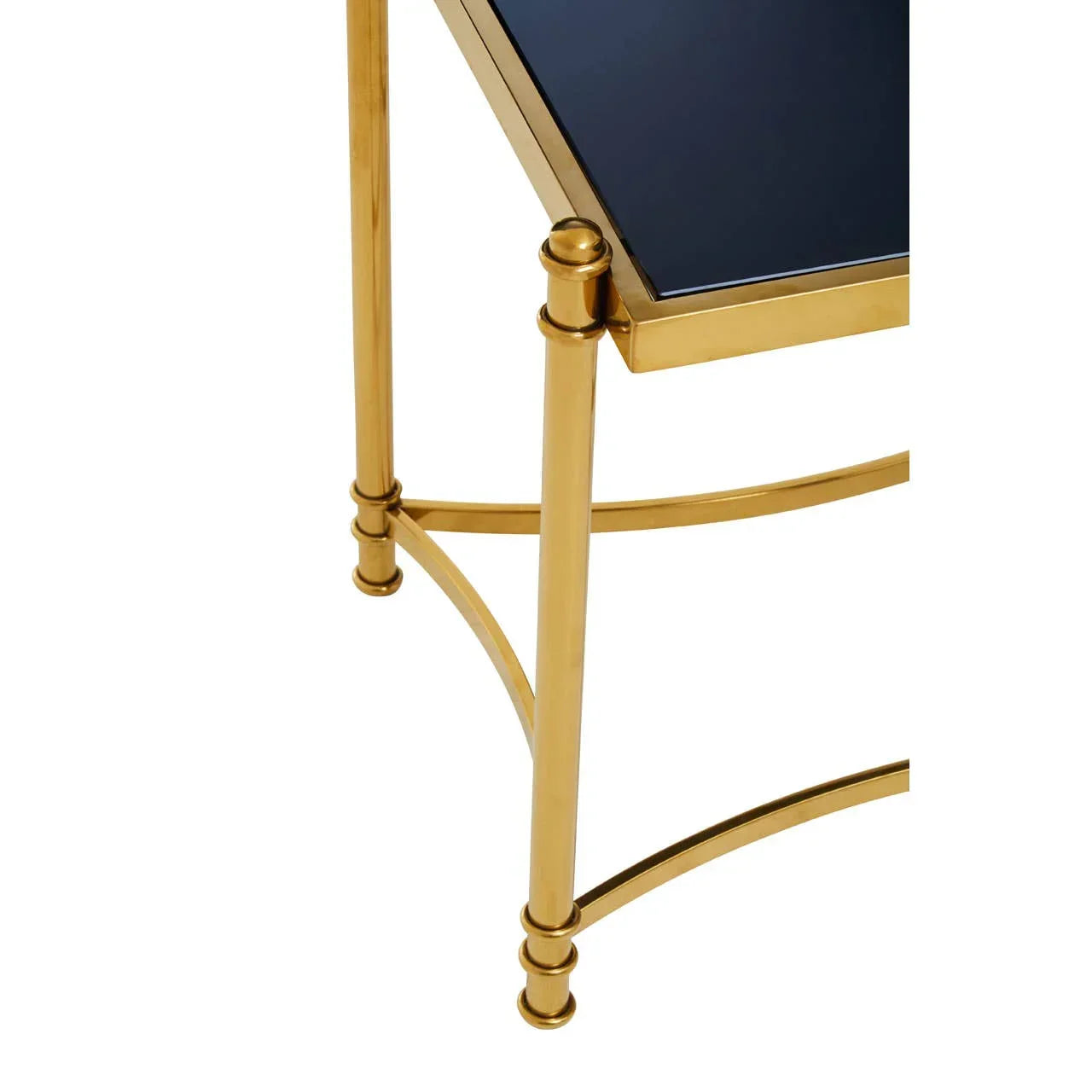 Gold metal side table frame with black glass top, corner view highlighting leg detail