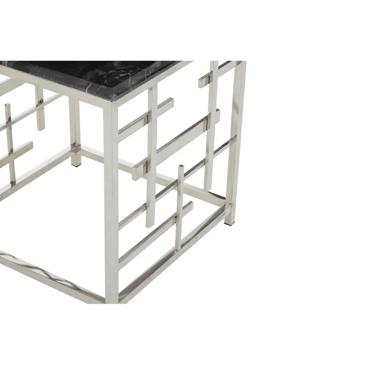 Side view of metal and marble side table with geometric chrome frame