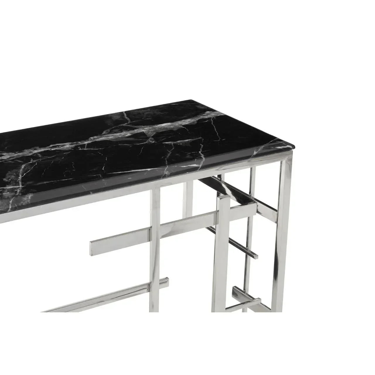 Modern console table with black marble top and chrome metal frame, partial side angle view